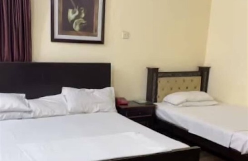 Johar Town Hotel | Omega Inn Hotel