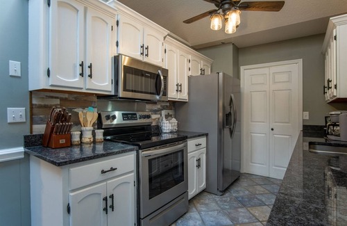 Brevard House | On Golf course, near pool, screened porch split bedroom plan