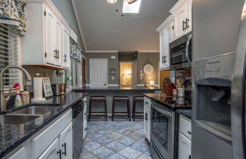 Brevard House | On Golf course, near pool, screened porch split bedroom plan