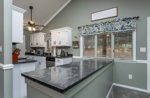 Brevard House | On Golf course, near pool, screened porch split bedroom plan