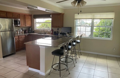 Fort Pierce House | On Hutchinson Island. Large upstairs suite, private pool, beach is minutes away.