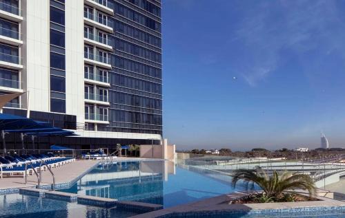 Dubai Media City Apartment | ON OFF HH-AVANI HOTEL-3BR -Full Palm View