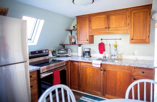 Waterbury House | On the River A-Frame. Cozy 4 season river, lake and ski retreat.