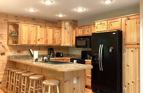 Gatlinburg - Pigeon Forge Cabin | One acre private 4 bedroom + loft! Hot tub, fire pit & game rooms!