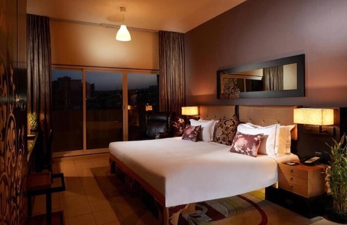 Discovery Gardens Hotel | One Bedroom Apartment In Discovery Gardens By E R