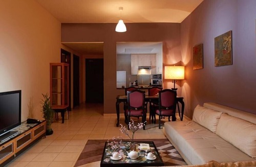 Discovery Gardens Hotel | One Bedroom Apartment In Discovery Gardens By E R