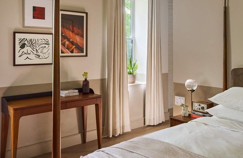 Fishtown Hotel | One-Bedroom King Suite with Living Area & Privacy
