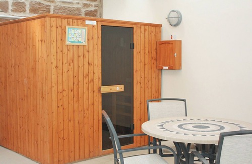 Warenford Cottage | One of five holiday homes with swimming pool, gym and tennis courts on site.