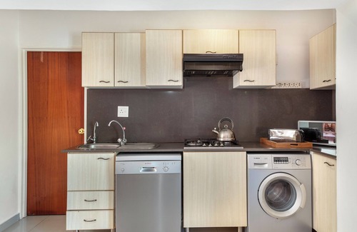 Sunset Beach Villa | One of the separate entrance apartment, inside Sunset Residence.