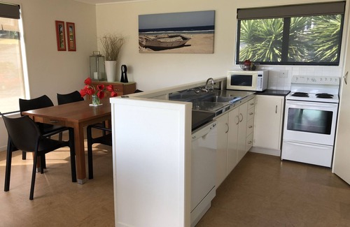 Onemana House | ONEMANA. Premium location. Walk across the road to the beach.