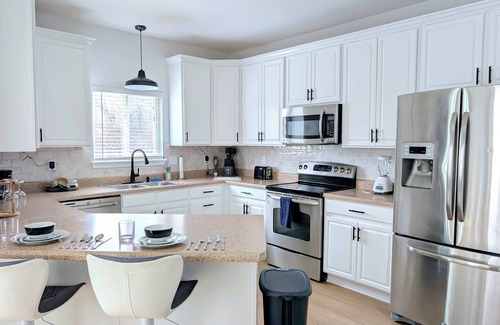 St. Charles House | Opulent 3-Bedroom Home w/Garage- Monthly Stays Only