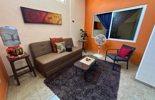 Colonia 5 de Diciembre Apartment | Orange Butterfly