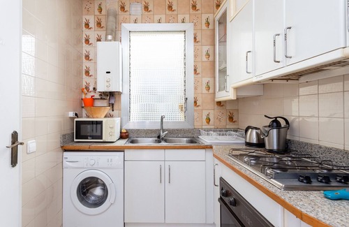 El Camp de l'Arpa del Clot Apartment | Orange Duplex with sunny terrace in Barcelona
