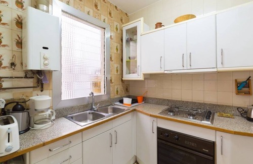El Camp de l'Arpa del Clot Apartment | Orange Duplex with sunny terrace in Barcelona