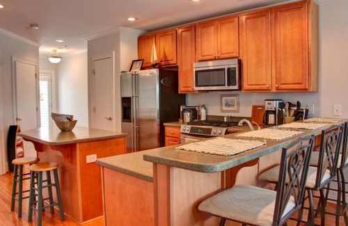Oriental Condo | Oriental Harbor Place, B-8 - Unwind by the water