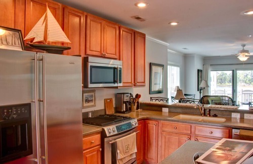 Oriental Condo | Oriental Harbor Place, B-8 - Unwind by the water