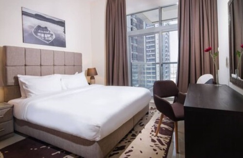 Dubai Sports City Apartment | OSKENA Vacation Homes - The Medalist Tower Sport city