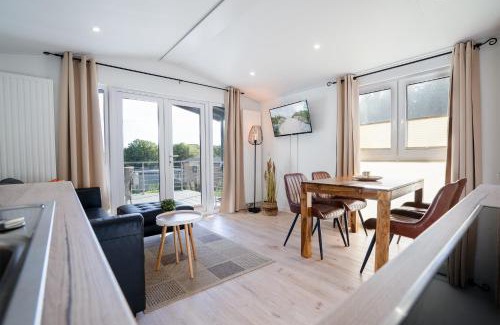 Gronenberg House | Ostseecamp Lübecker Bucht Haus "Morgensonne" mit überdachter Veranda