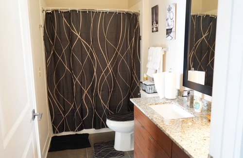Beachwood Apartment | Our bright and airy apartment offers 1 bedroom, featuring a queen-size bed