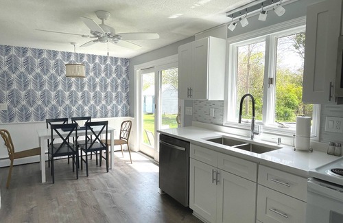 East Falmouth Cottage | Outdoor Shower, Firepit, BBQ, AC units and more! Near downtown and beaches!