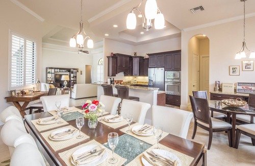Central Naples House | overlooking a nature preserve and lake, this pool with spa home has it all