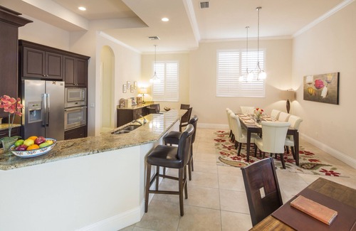 Central Naples House | overlooking a nature preserve and lake, this pool with spa home has it all