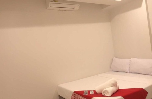 San Andres Bukid Hotel | OYO 1128 W Sangco Building Leasing