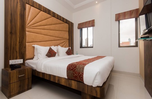 Girgaon Hotel | OYO 15519 Hotel Grand Residency