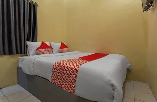 Palangkaraya Hotel | OYO 2527 Hotel Triana