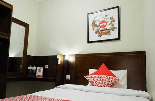 Depok Hotel | OYO 646 Kvinn Kostel