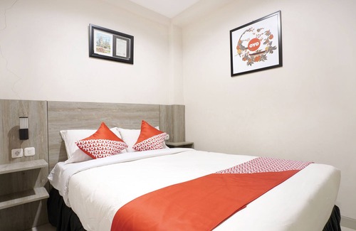 Depok Hotel | OYO 646 Kvinn Kostel
