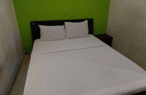 Kalimantan Hotel | OYO 93400 Pondok Tawing Rumbih