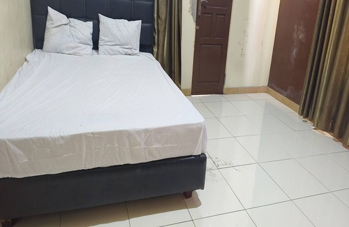 Marabahan Hotel | OYO 93752 Aglo Homestay NearYani Heahlerr