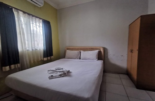 Borneo Hotel | OYO 94121 Widan Homestay