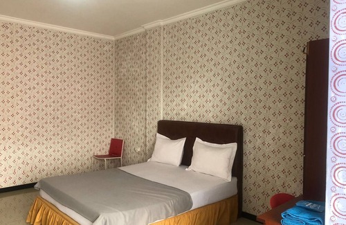 Samarinda Hotel | OYO 94667 Madina Homestay