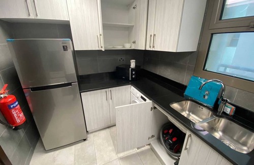 Khalifa City Apartment | OYO HOME 1381 Premium 1 BHK With Balcony