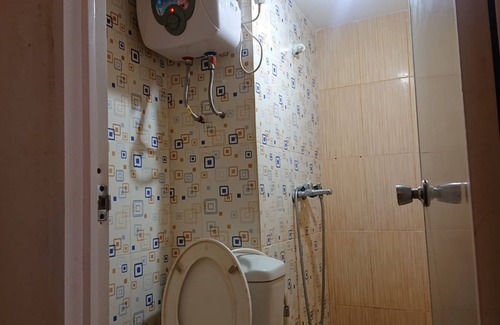 Karawang Hotel | OYO Life 93139 Apartemen Grand Sentraland By Evi