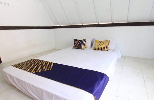 Tanjung Hotel | OYO Life 93154 White Kos Jenggala
