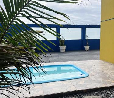 Itapoa House | PÉ NA AREIA Apto Manfron