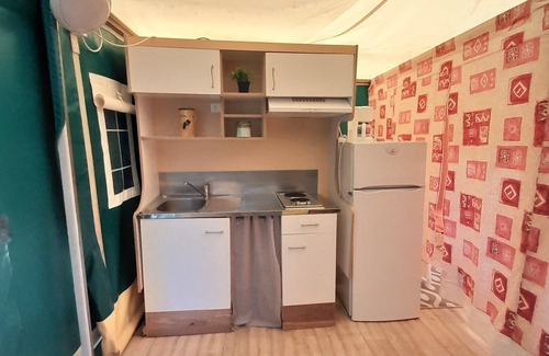 Fajoles RV Rental | Pagan tent. On flat, shady grounds, with swimming pool. Quietly.
