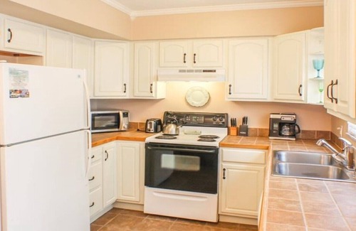 Holmes Beach Villa | Palm Oasis East Villa, Shared Heated Salt Pool, Steps to the Beach, Ground Level