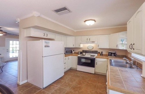Holmes Beach Villa | Palm Oasis East Villa, Shared Heated Salt Pool, Steps to the Beach, Ground Level