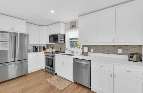 Sarasota Villa | Palm Paradise: Near Siesta Key Beach, Heated Salt Water Pool by Gulf Coast Holiday Homes