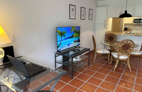 Williams Town Condo | Palm Tree Cove - Stunning Partial Ocean Views; Beachfront Location!