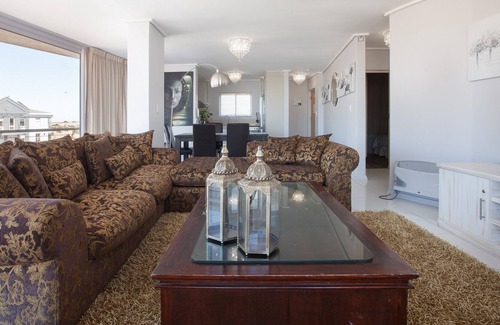 Lagoon Beach Apartment | Panoramic Views with Balcony, Beach and Bar Access