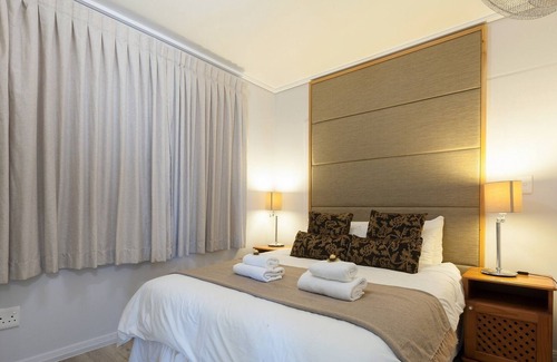 Lagoon Beach Apartment | Panoramic Views with Balcony, Beach and Bar Access
