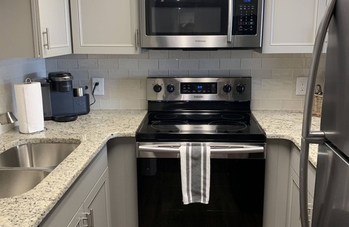 Mid America Condo | Paradise Awaits: Luxury Condo with Lakeview and Pool at Your Doorstep!"