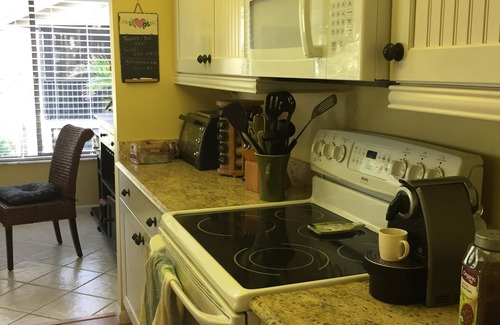 Stuart House | Paradise- townhome with views of the lake and golf course, walk to the beach!