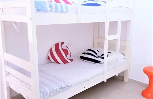 Jardim Centenario Apartment | Paraiso no Guarujá Enseada - Piscina - Ar Condicionado - WIFI - Garagem