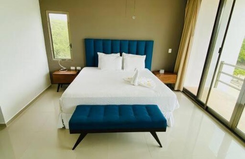 Villa Juarez Apartment | Paraiso304; Luxury condo 3 min walk to the beach.